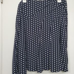 Black and white polka dot skirt with interesting pleats